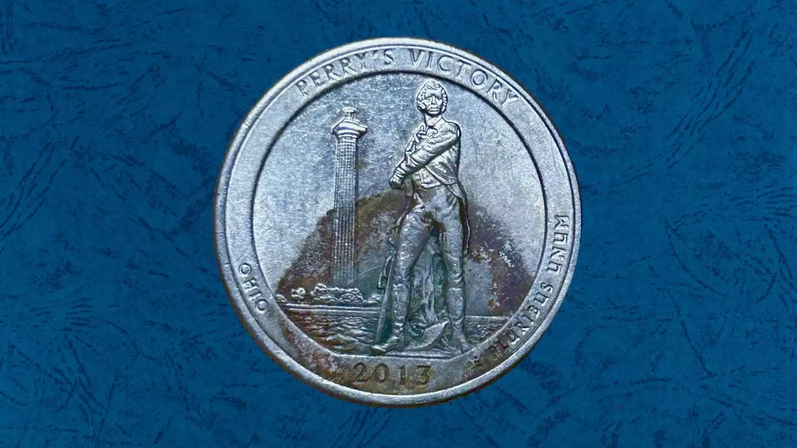 2013 quarter missing clad layer error showing copper obverse and normal nickel reverse