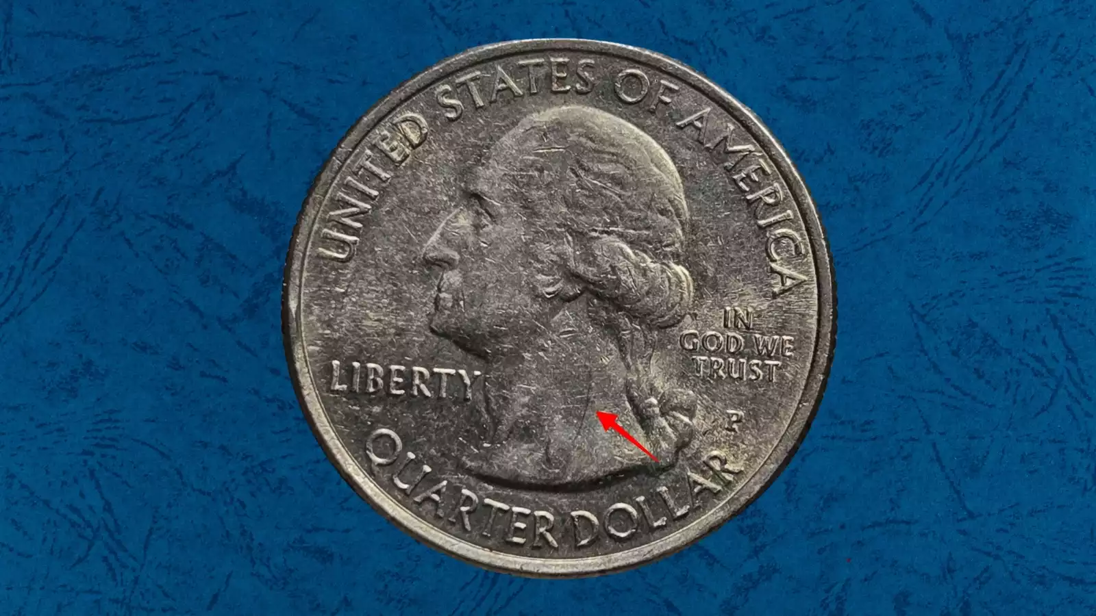 2013 Great Basin quarter die cud error showing raised rim blob from die break